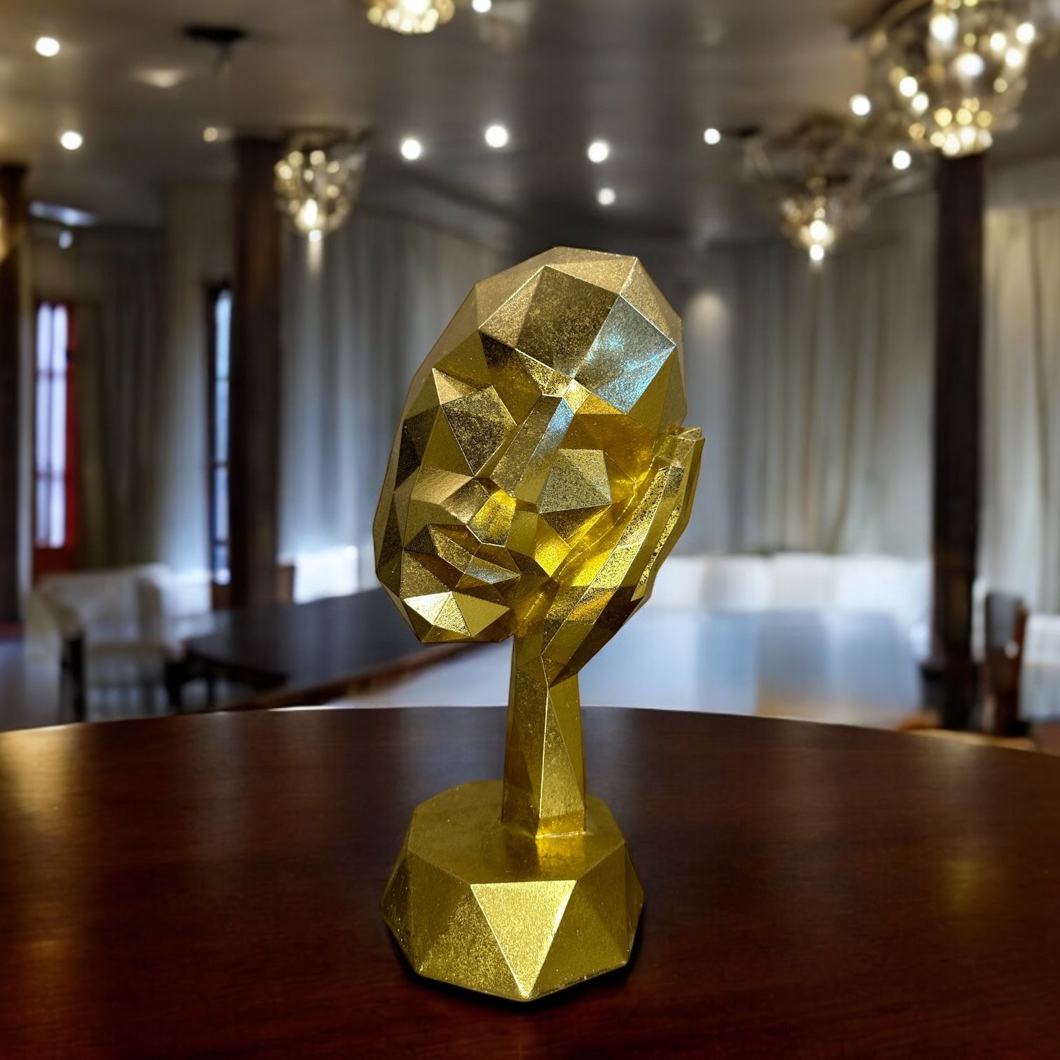 GOLDEN FACE SCULPTURE